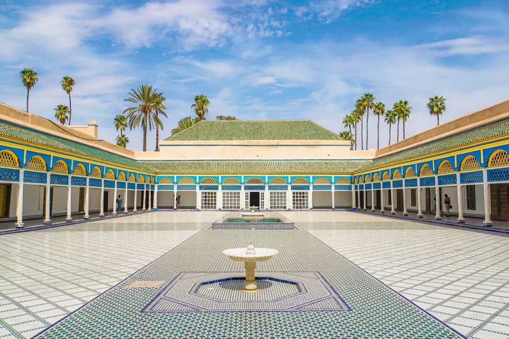Courtyard of the Bahia Palace in Marrakech with a tiled floor and fountain